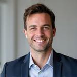 Portrait of Alex Thorne, Founder and CEO of ThriveVault.