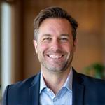 Portrait of Marcus Chen, Lead Financial Coach at ThriveVault.